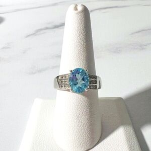 2.80ct Glacier Topaz And 0.22ctw White Topaz Rhodium Over Sterling Silver Ring